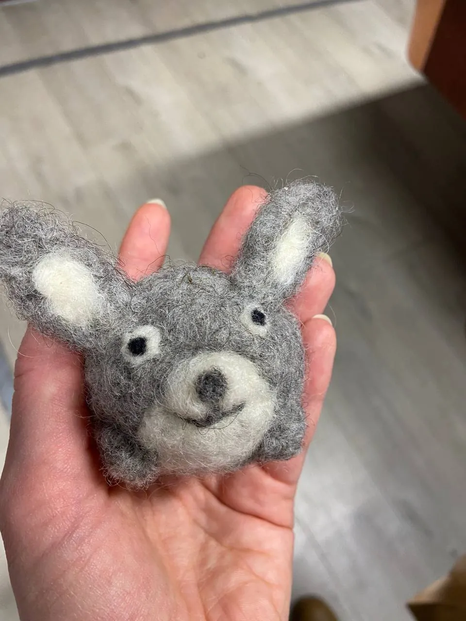 A felted bunny made at a workshop